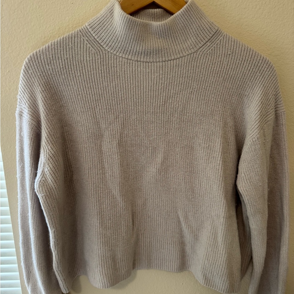 Merino Wool-Blend Rib Turtleneck Sweater